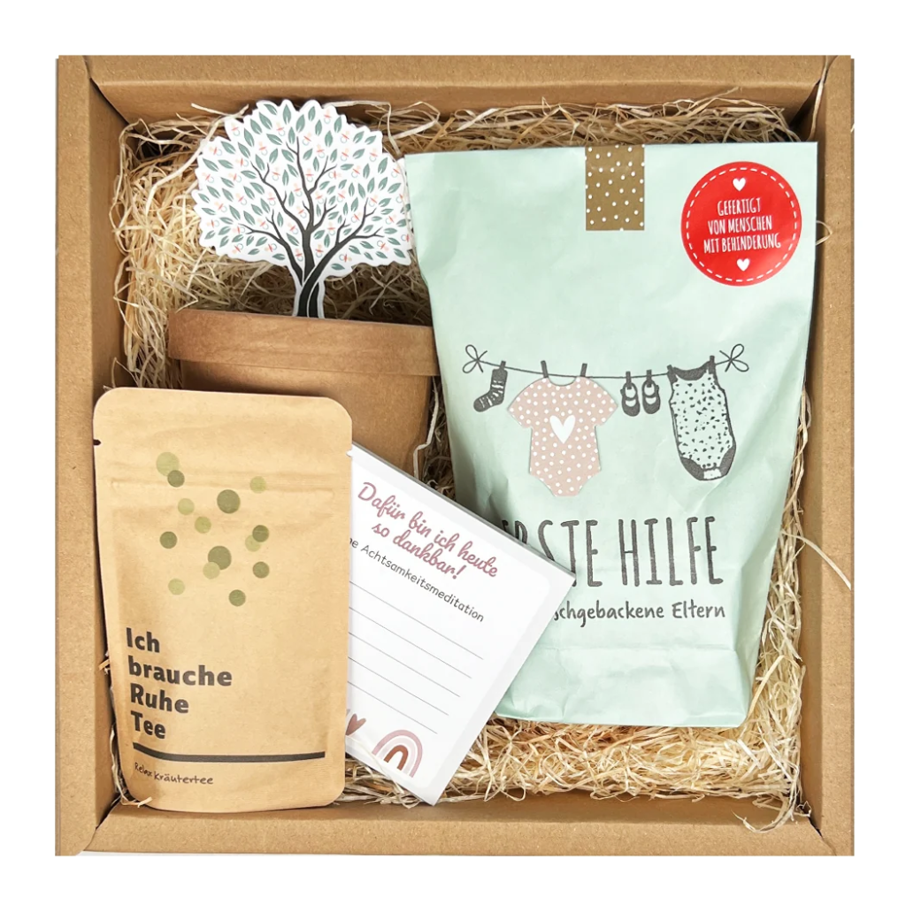 Geschenkbox für werdende Eltern mit Tee und liebevollen Überraschungen